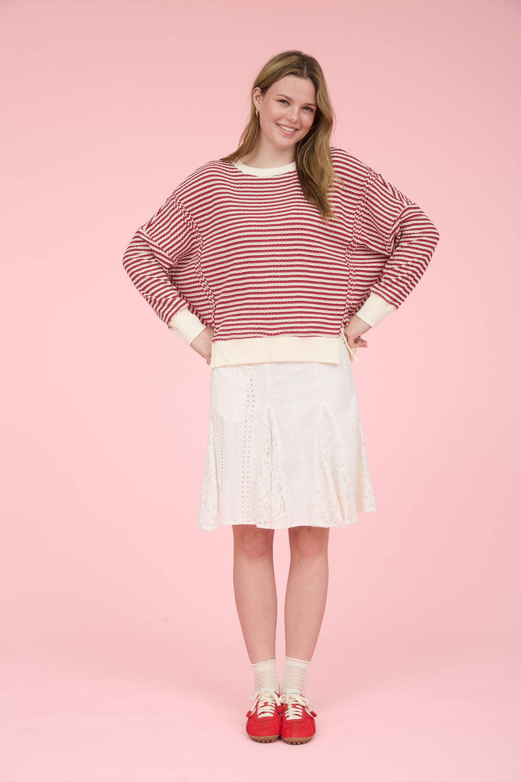 STRIPE EXPOSED SEAM SPLIT HEM LONG SLEEVE KNIT TOP
