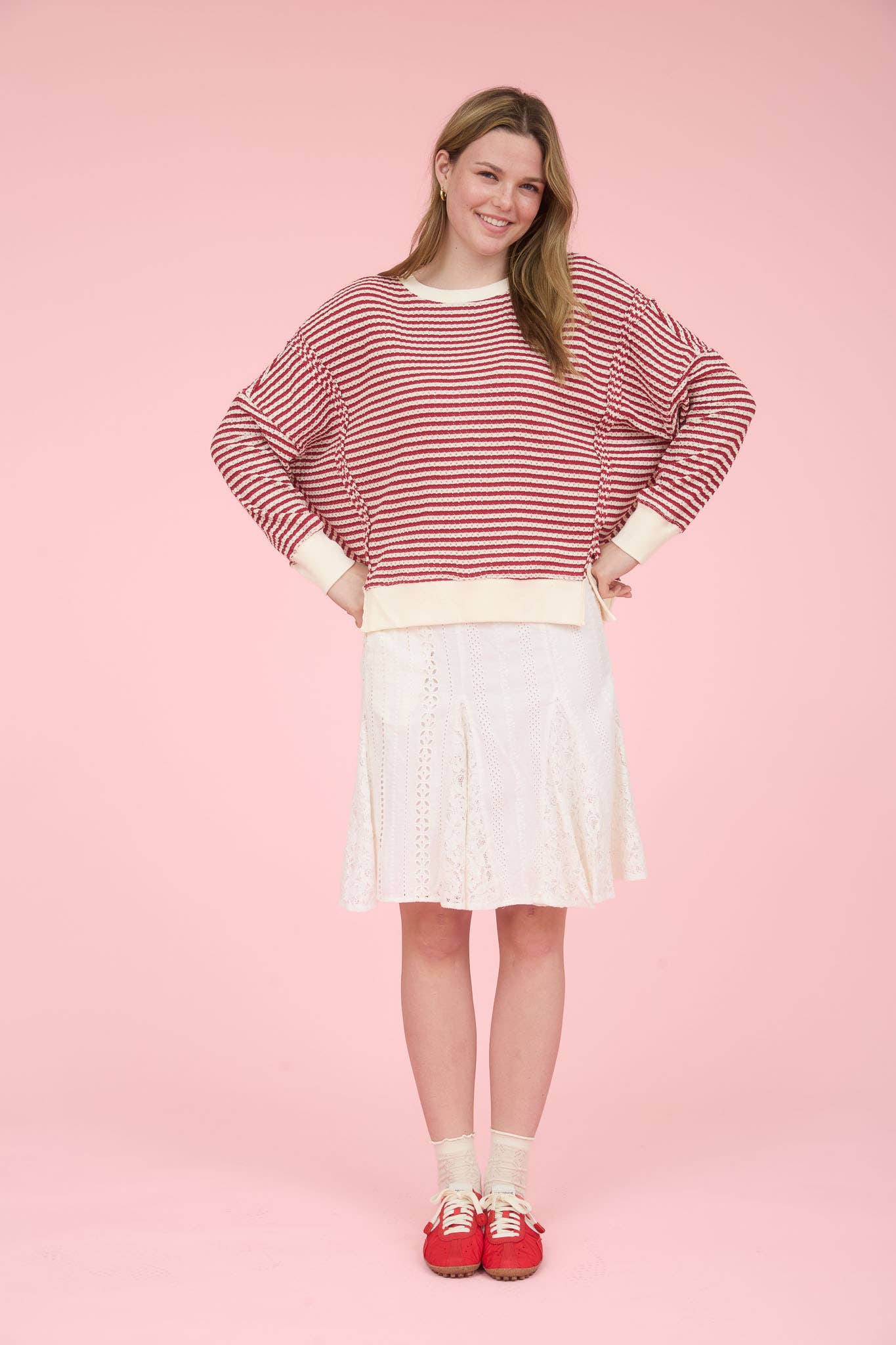 STRIPE EXPOSED SEAM SPLIT HEM LONG SLEEVE KNIT TOP